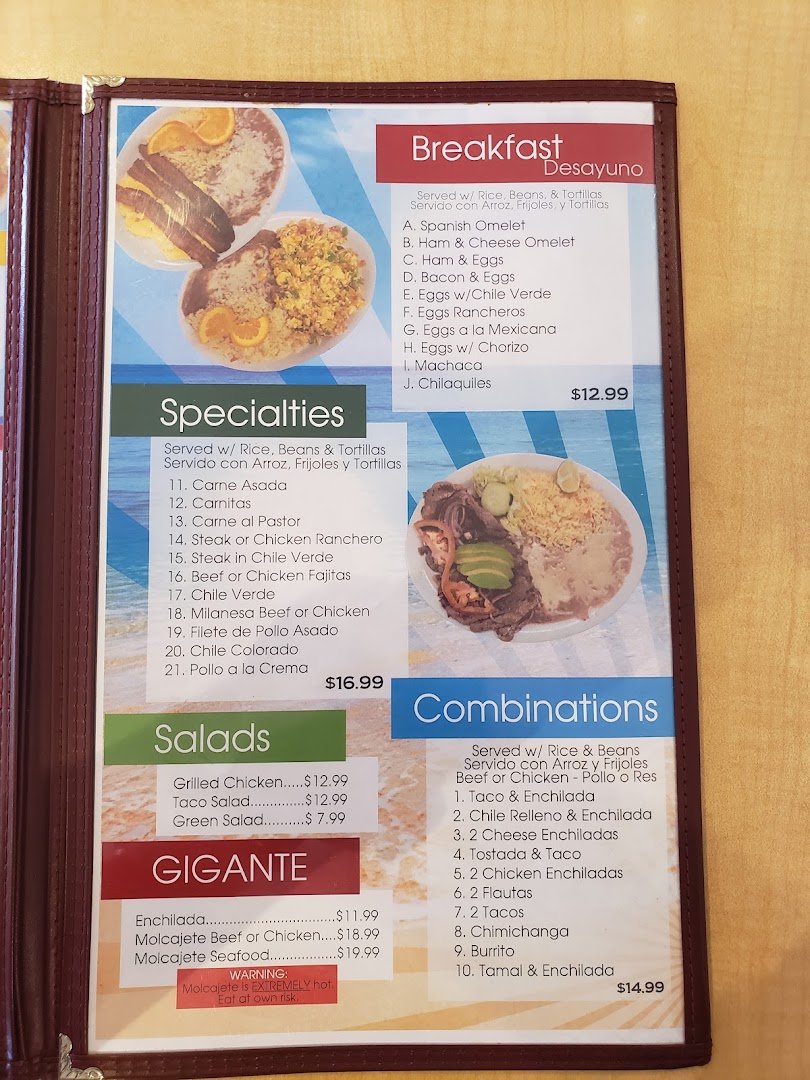 Seafood dishes served in a modest dining room.